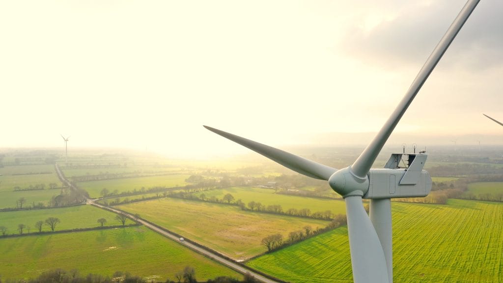 Aerial photo of wind turbines at sunset in Sainte Pazanne, France
